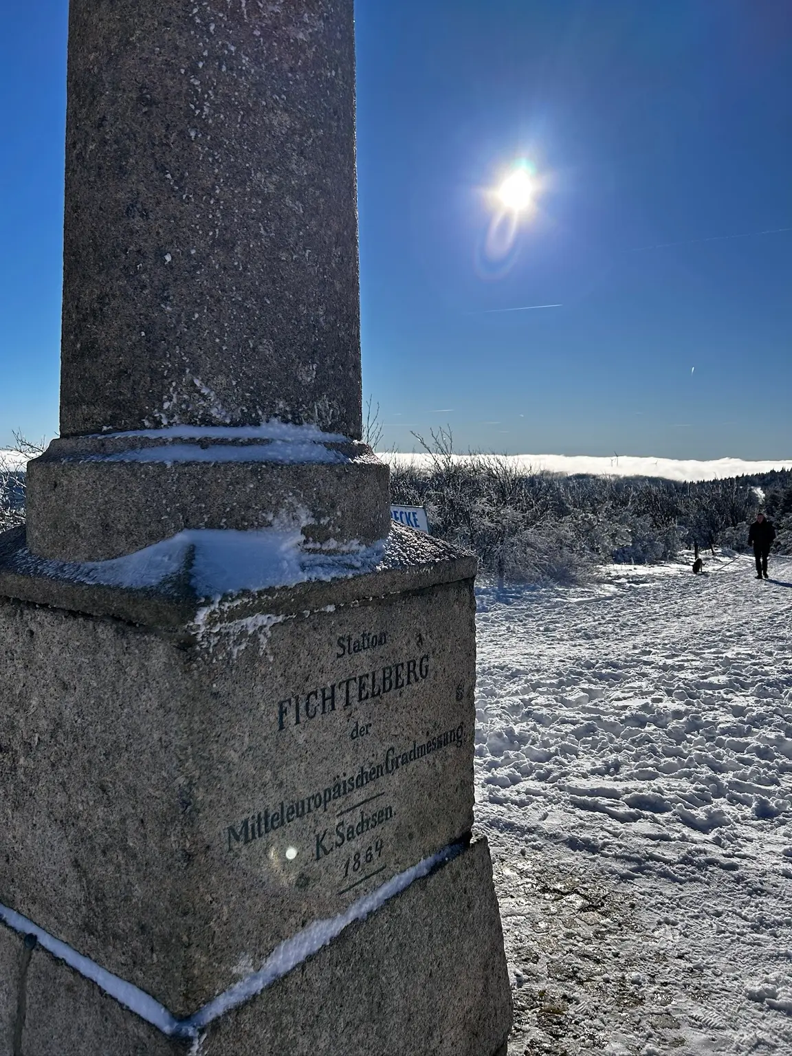 Close view of the 1864 Central European Arc Measurement inscription on the Fichtelberg column