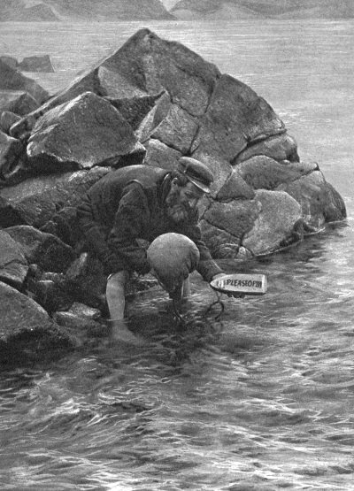 Historic photograph of a man demonstrating the launch of a St Kilda mailboat at the shore